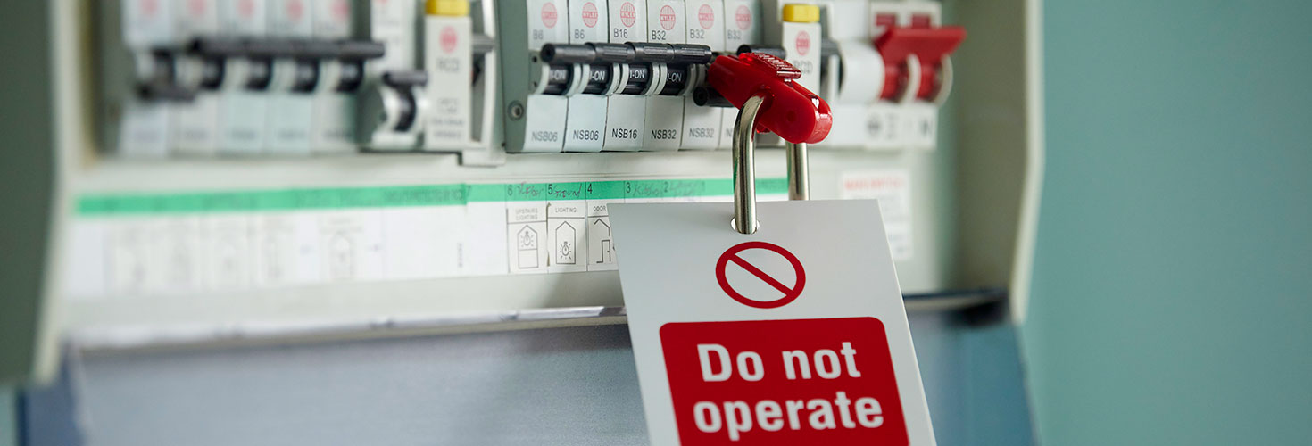 Broken Domestic Fuse Box With Warning Label Saying Do Not Operate